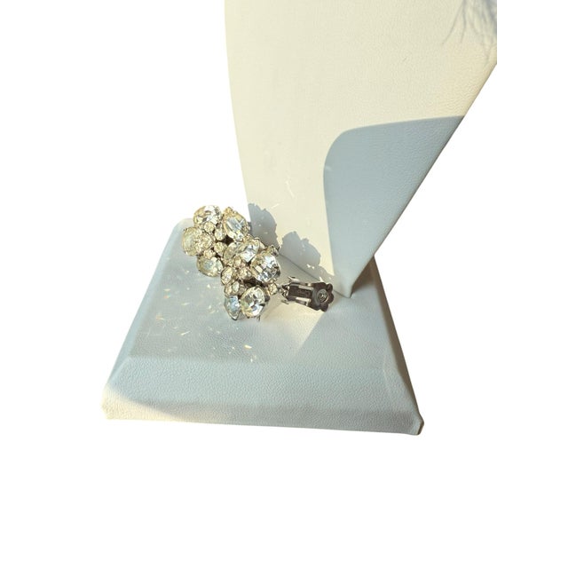 Vintage Coro Costume clip on Earrings Tiered cluster faux diamonds. Mid-20th century Marked Coro on Levered Back 1” round...