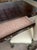 Maitland-Smith partners desk wrapped entirely in leather. The six drawers are lined with marbled paper and have brass...