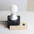 The Block Lamp is a hand-crafted wood and limestone table lamp from the Raw Collection by Gabor Gobi, constructed from a...