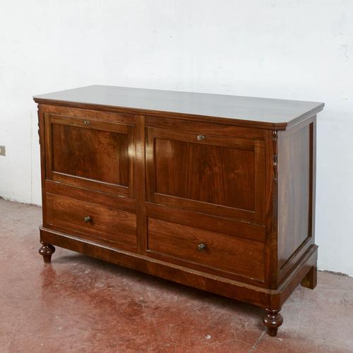 This refined chest-shaped sideboard, dating back to the mid-19th century, is an excellent example of functional cabinetry...