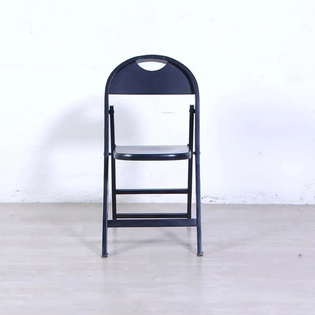 Interesting 60s design chairs. Structure in black lacquered beech wood. Folding, very simple closing mechanism. Well...