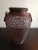This is a Hamdmade Decorative Rattan 8.5" Vase with Holders. Procured at an auction