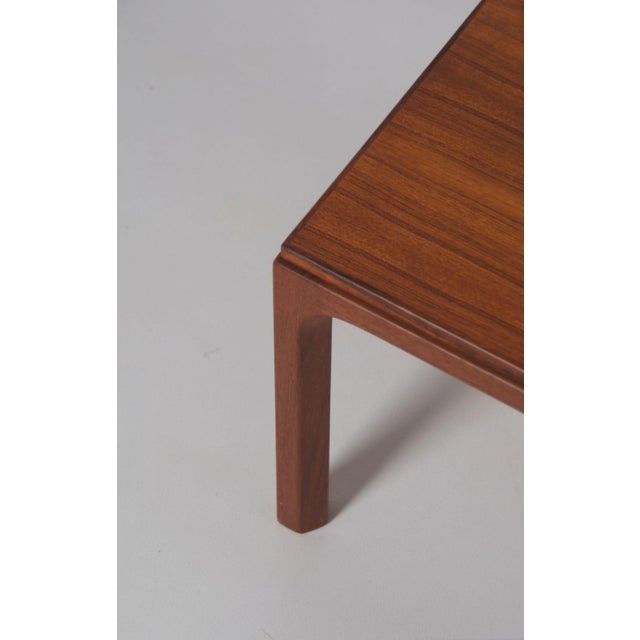 Danish side table 381 designed by Kai Kristiansen in the 1960s. It is made of teak by the renowned furniture company Aksel...