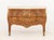 Louis XV Style Walnut Bombe Commode, pink marble top above two drawers with marquetry inlay on scroll form legs. 31.25" H...