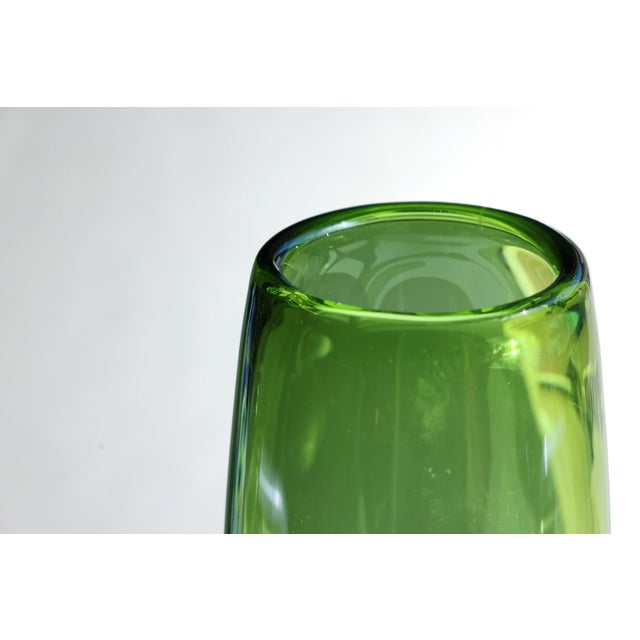 Homegaard torpedo-shaped green glass vase Pattern No. 18122. Designed by Per Lütken. Color: Green Signed at base. Made in...