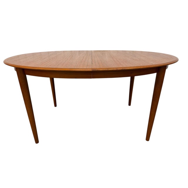Bring timeless Scandinavian elegance into your dining space with this beautiful Vintage Danish Modern Oval Teak Dining...