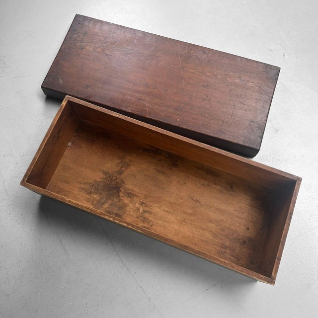 Elegant and functional wooden storage chest from Japan. This elongated form was traditionally used for carefully storing...