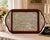 An exceptional vintage Hazorfim sterling silver and mahogany challah tray featuring an ornate engraved silver panel...