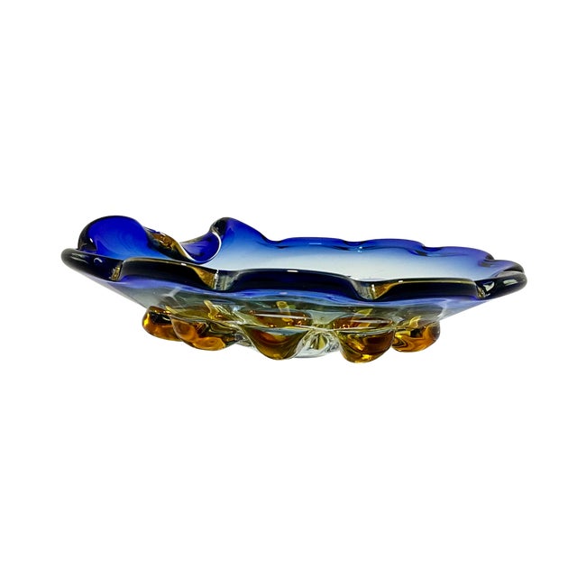A striking piece of mid-century Chalet art glass, this heavy hand-blown ashtray or catch-all bowl features a vivid cobalt...