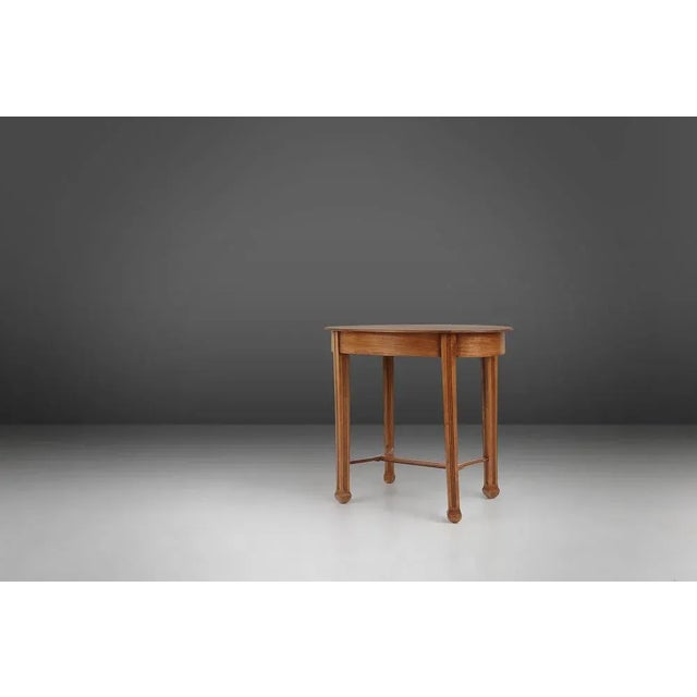 France / 1930s / Art Deco / blond oak oval side table / Mid-century design An epitome of timeless elegance and...