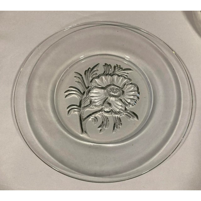 Very nice heavy plates with a cut glass flower in the center. Vintage and very pretty.
