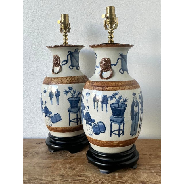 This exquisite pair of vintage table lamps beautifully illustrates the timeless appeal of Chinoiserie design. Crafted from...