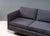 USA, ca. 1960s. A handsome tuxedo style sofa very much in the spirit of American designer Florence Knoll. Features a heavy...