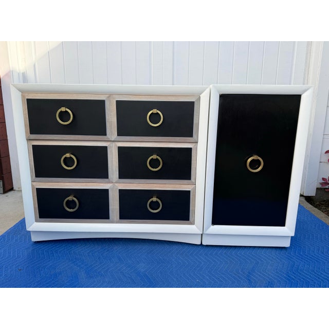 Set of 1950’s Black and white dresser and cabinet designed by T.H.Robsjohn-Gibbings for Widdicomb. Brass pulls. Dresser...