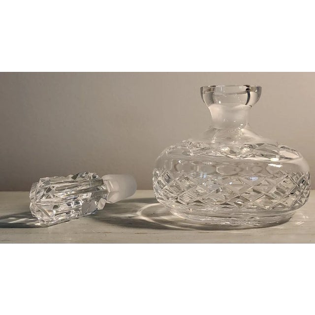 Elevate your dressing table with this brilliant vintage cut crystal perfume scent bottle in the classic Waterford style,...