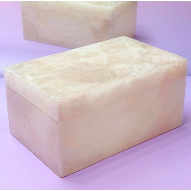 The Rose Quartz Large Jewelry/Accessory Box with Lid is carefully hand-carved from soothing rose quartz, known for its...