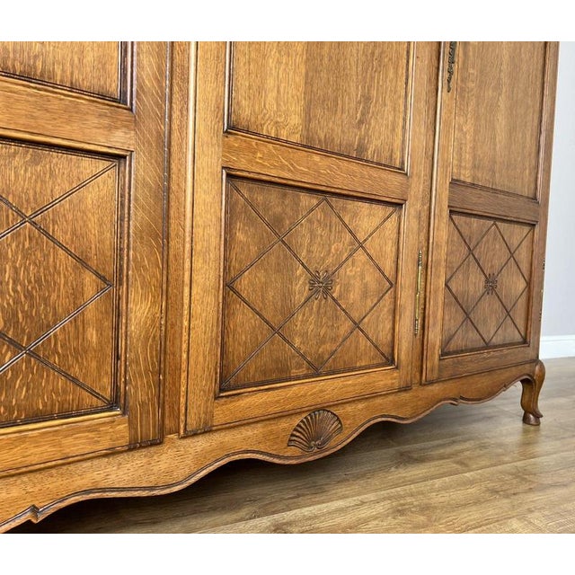 Vintage Louis XVI French Three Door Oak Carved Armoire For Sale - Image 9 of 13