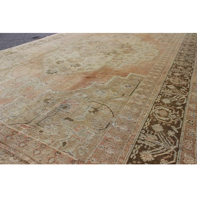 Mid 20th Century Vintage Turkish Oushak Rug With Medallion and Cornices in Light Orange & Brown For Sale - Image 5 of 7