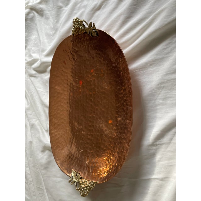 Decor Copper Hammered Oval tray is hand-made, an original work of art. Perfect for an artful buffet display, the Solid...