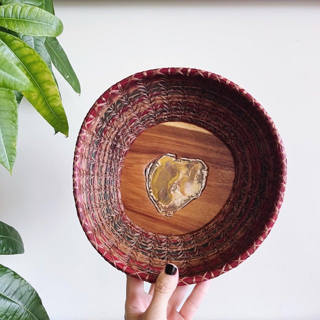Vintage handwoven pine needle basket with inlaid petrified wood piece. Lovely vintage condition, unique piece! 10”...