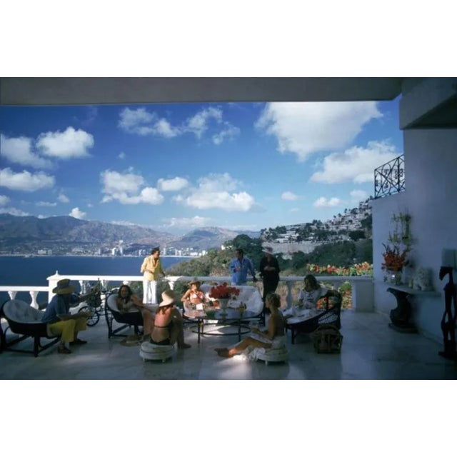 Guests At Villa Nirvana 1978 by Slim Aarons Slim Aarons Limited Estate Edition Guests at the Villa Nirvana, owned by Oscar...