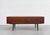 Mid Century Modern Rosewood Low Height Credenza, Made in Denmark, c. 1960’s. Its distinctive low profile and compact...