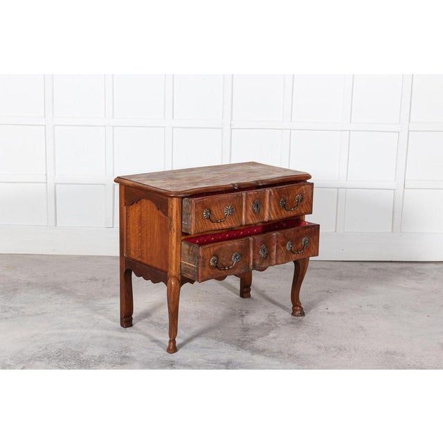 Early 19th century French walnut commode from Circa 1830 - a two drawer commode with hoof feet detail and lovely warm...