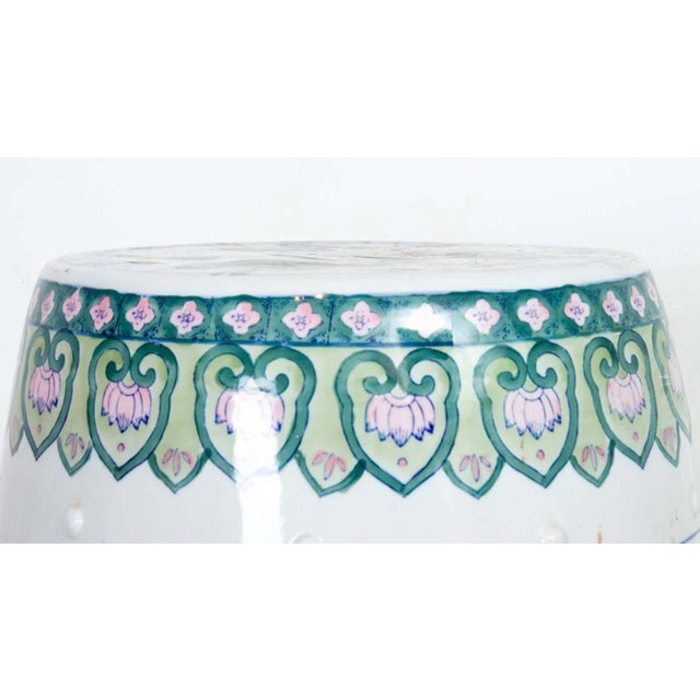 Chinoiserie Ceramic Garden Stool, in good overall condition. Slight wear to finish from age and use. Bright spots in...