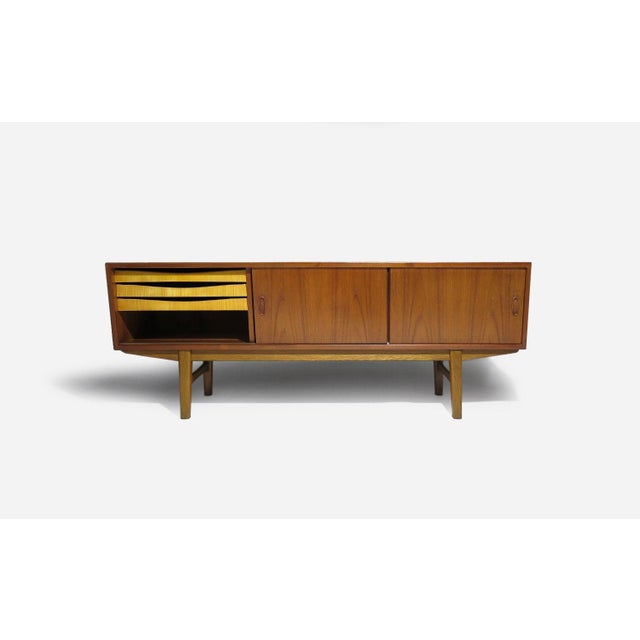 Mid-Century Danish Teak Credenza With Angled Front & Sliding Doors For Sale - Image 4 of 12