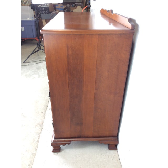 This antique country style sideboard features hardwood construction, original maple finish, three dovetailed drawers with...
