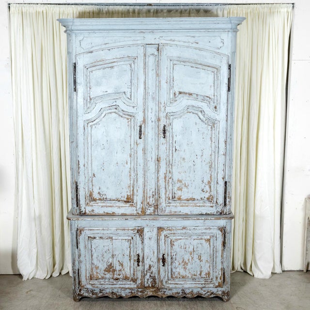 A superb 17th-century Louis XIV period buffet à deux corps expertly handcrafted in walnut by skilled ébénistes near Lyon,...