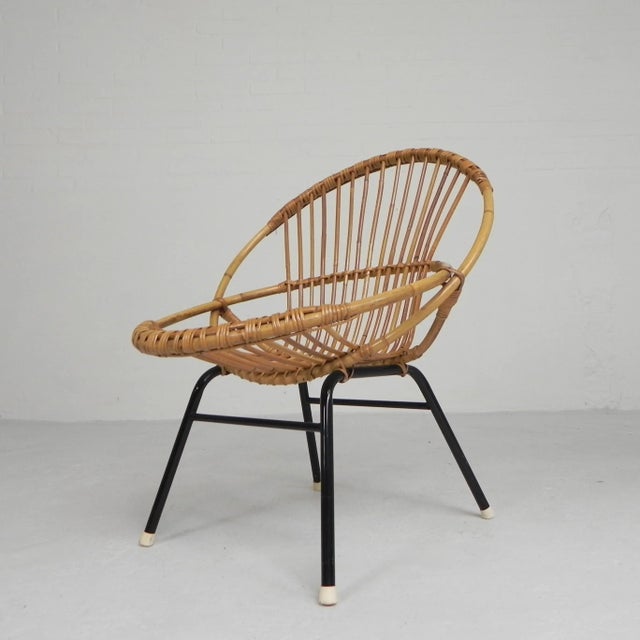 Typical 1960s design by Rohe Noordwolde, with artisanal bamboo construction. Height: 72 cm. Width: 59 cm. Depth: 59 cm....