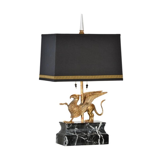 Cast composite in antique gold on marble plinth 31h x 11w x 6d Shade Dimensions: top(10 x 16) bottom(11 x 17) side(11)