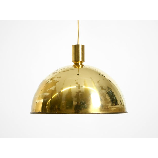 Original 1970s florian schulz pendant lamp made of heavy brass. Model: posa. Great minimalist design. no bumps or dents on...