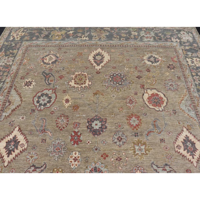 Large All-Over Designed Tabriz With a Yellow-Taupe Background and Muted Colors For Sale - Image 4 of 12
