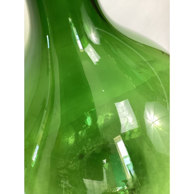 Stunning hand blown Italian Demijohn in Emerald Green. Well over 100 years old, this one of a kind demijohn is a beautiful...