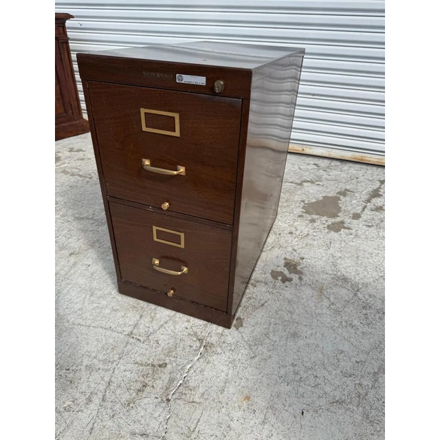 Heavy duty 1940s 2-drawer steel file cabinet made in the USA by Shaw Walker, with a faux wood or faux bois printed finish....