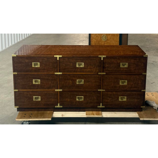Wow! We just love this truly special, absolutely stunning Campaign piece by Henredon. This gorgeous lowboy features a rich...