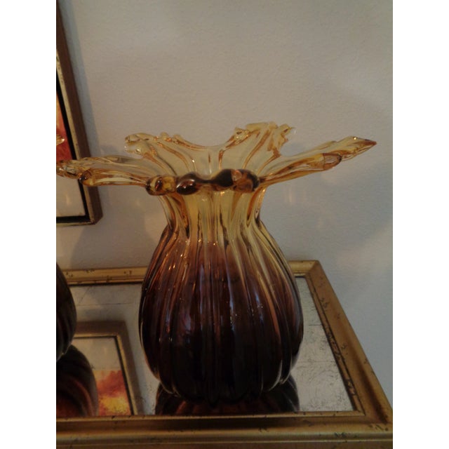 A striking pair of Italian glass vases. They are handblown with exceptional artistry and attributed to the renowned...