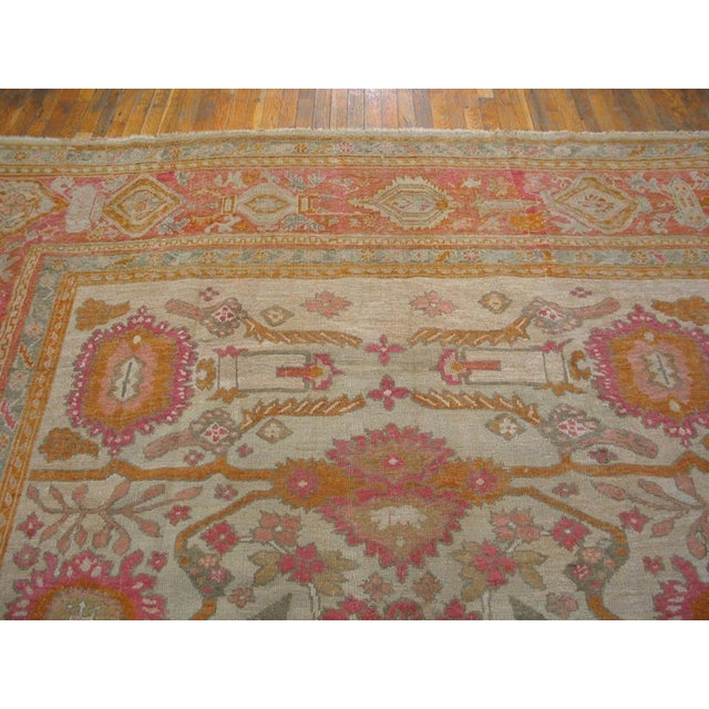 Beautifully Decorative Light Ivory Background Antique Turkish Oushak Rug For Sale In New York - Image 6 of 7