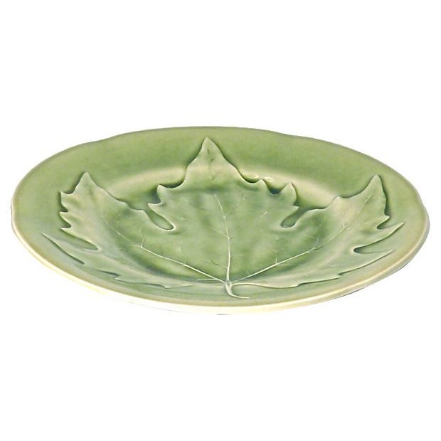 This 19th century, maple leaf French majolica plate depicts a large green maple leaf in relief. This ceramic plate has a...