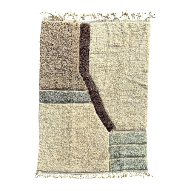 This handmade Moroccan Mrirt rug is a refined contemporary interpretation of traditional Berber craftsmanship. Hand-...