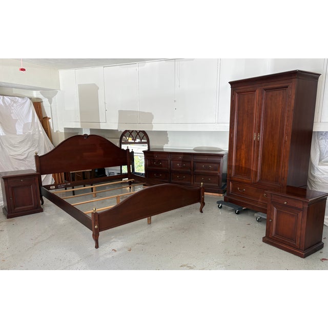 Beautiful 1990's Ethan Allen bedroom set in a rich cherry wood finish. Traditional, timeless design with brass hardware...