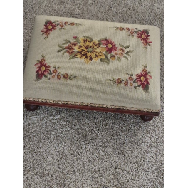 This vintage footstool showcases classic elements of mid-to-late 19th-century Victorian revival design. Upholstery: A...