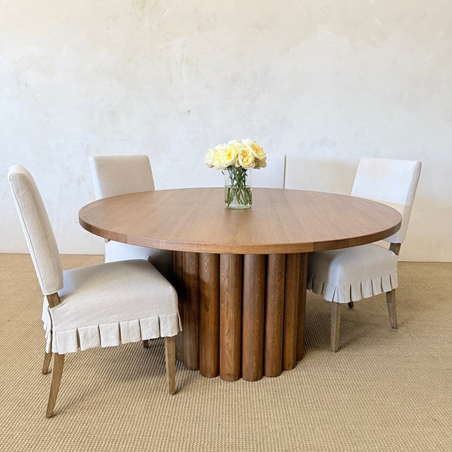 Lavene Dining Table in Oak 60″ Crafted from solid oak, this dining table combines timeless craftsmanship with a clean,...