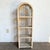This Boho Chic wicker étagère features a charming arch top design, adding a coastal flair to any room. The natural wicker...