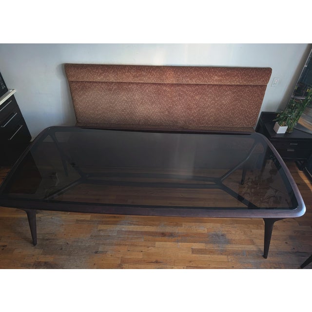 A sculptural Italian dining table "Seven Miles" from Ceccotti Collezioni, designed by Roberto Lazzeroni. It rests on...