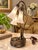 Striking vintage three-light table lamp featuring an elegant sculptural design inspired by lotus flowers and botanical...