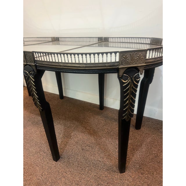 In three parts of equal length, the later mirror supported by the original oak substrate, surrounded by a gilded bronze...