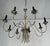 Beautiful neoclassical-style metal chandelier. This is a French work from Maison Charles. Circa 1940